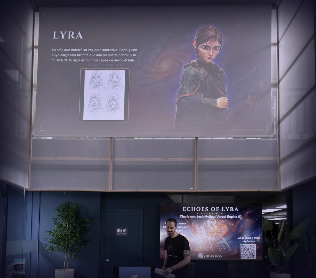 Lyra en la pantalla durante la charla